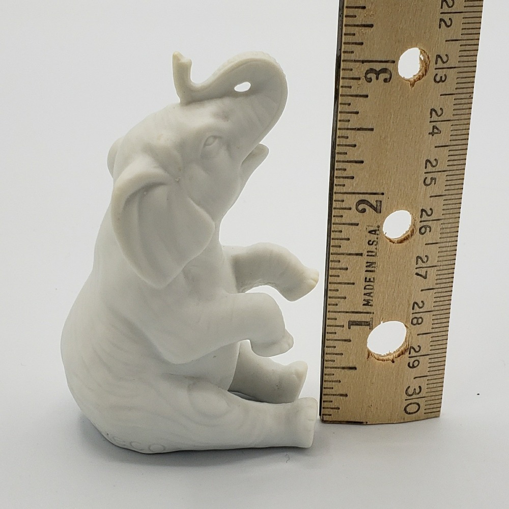 White Reco Porcelain Sitting‎ Elephant
